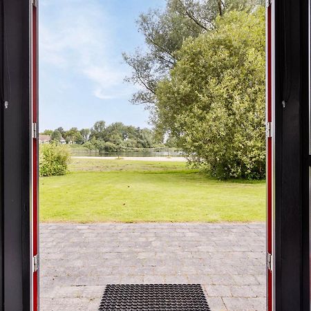 Vakantiehuis Aan Het Water -Incl Laadpaal- Ewijk Bagian luar foto
