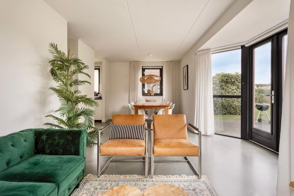 Vakantiehuis Aan Het Water -Incl Laadpaal- Ewijk Bagian luar foto
