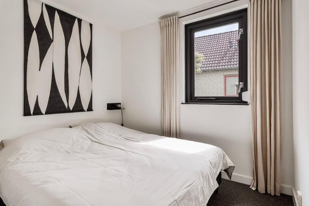 Vakantiehuis Aan Het Water -Incl Laadpaal- Ewijk Bagian luar foto